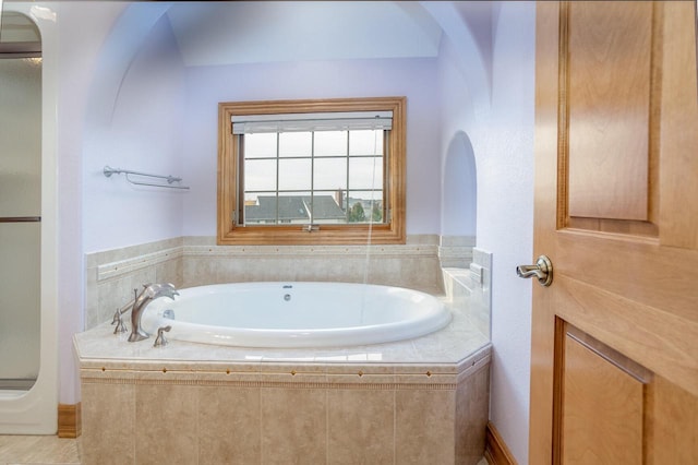 full bath featuring a garden tub