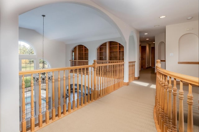 hallway featuring recessed lighting and carpet flooring