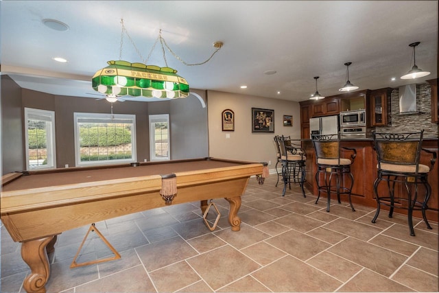 rec room featuring billiards, baseboards, light tile patterned floors, recessed lighting, and arched walkways