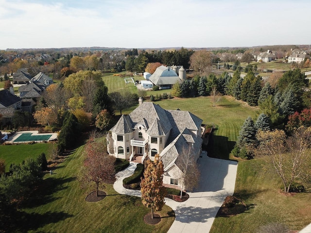 birds eye view of property with a residential view