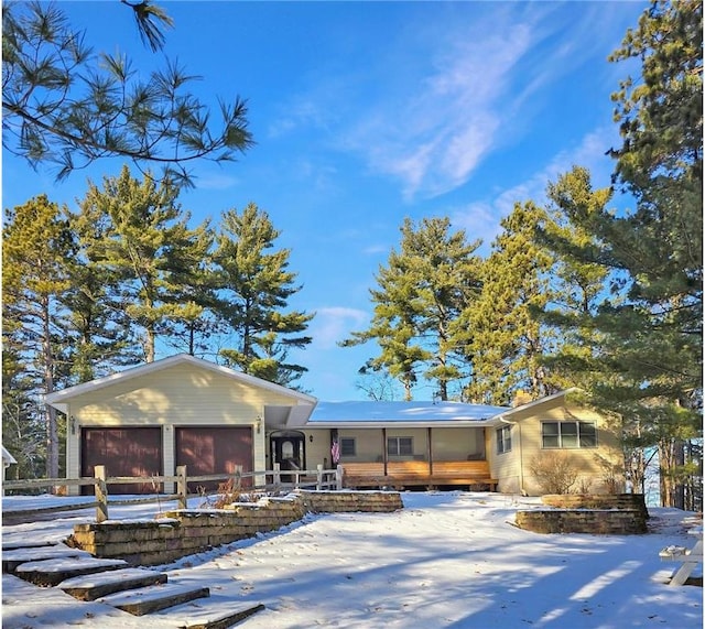 single story home with an attached garage