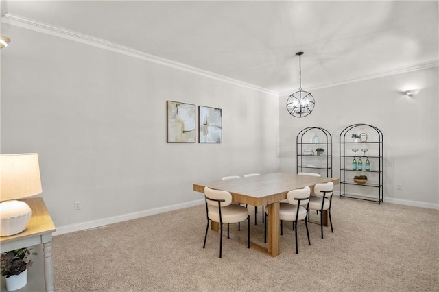 dining space with light carpet, baseboards, ornamental molding, and a notable chandelier