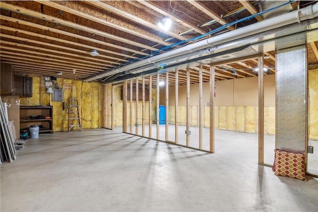 unfinished below grade area featuring electric panel
