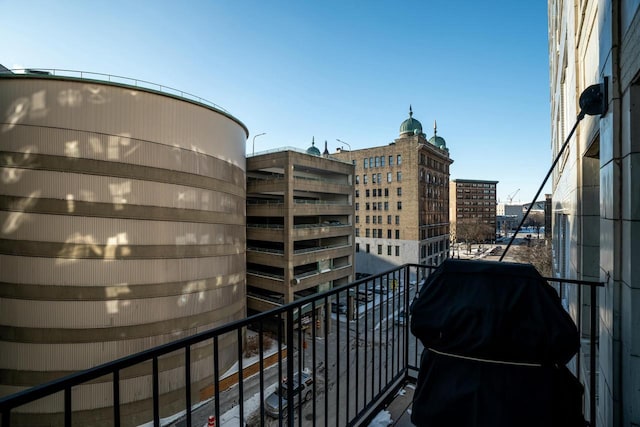 balcony featuring area for grilling and a view of city