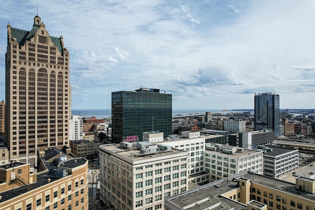 property's view of city with a water view