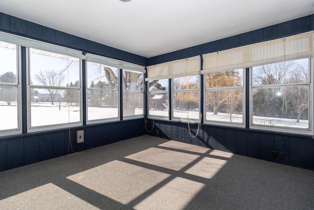 unfurnished sunroom with plenty of natural light