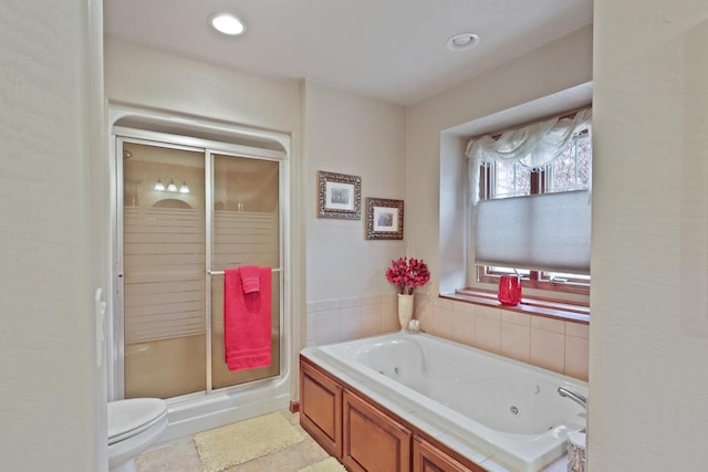 bathroom with a stall shower, a jetted tub, recessed lighting, tile patterned flooring, and toilet