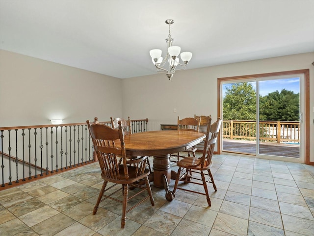 dining room featuring a notable chandelier