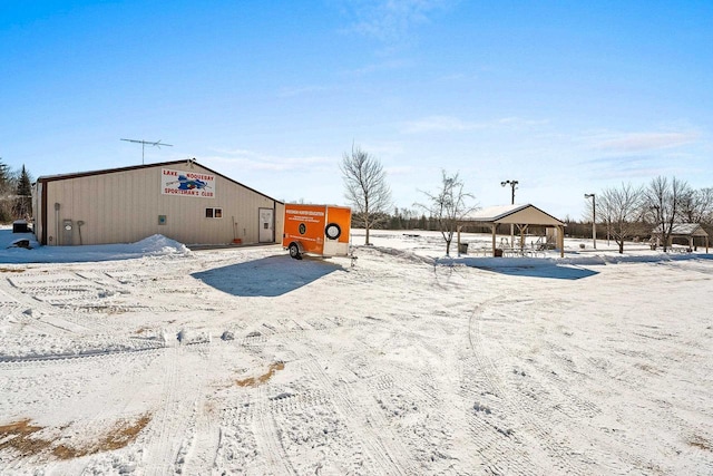 view of yard covered in snow