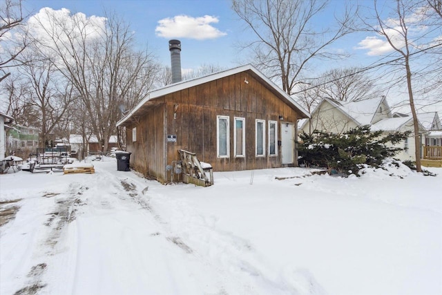 view of snow covered house