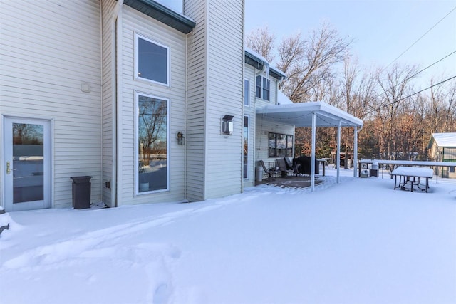 view of snow covered patio