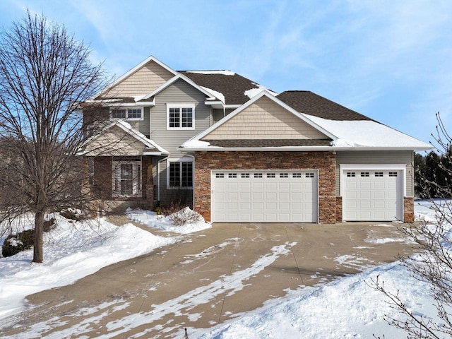 view of front facade featuring an attached garage and driveway