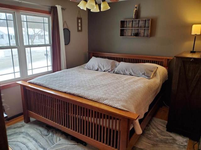 bedroom featuring multiple windows