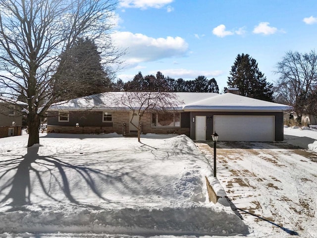 single story home with an attached garage