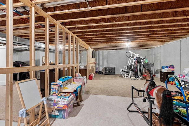 unfinished basement featuring carpet flooring