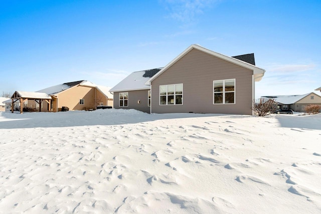 view of snow covered property