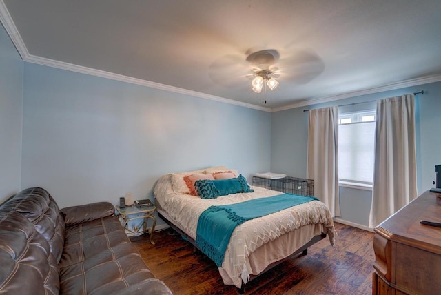 bedroom with dark wood-style floors, ornamental molding, baseboards, and a ceiling fan