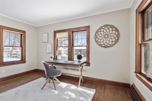 office featuring baseboards, dark wood finished floors, and a wealth of natural light