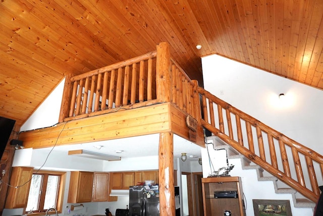 interior space with high vaulted ceiling and wood ceiling