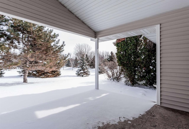 view of yard layered in snow