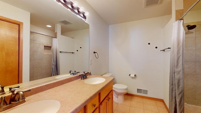 bathroom featuring a sink and visible vents