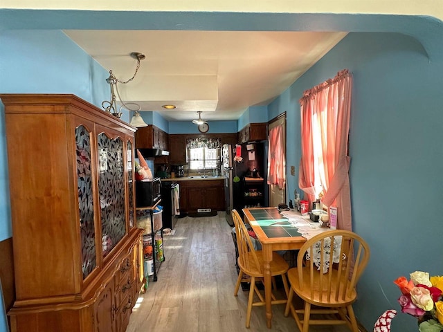 dining room with wood finished floors