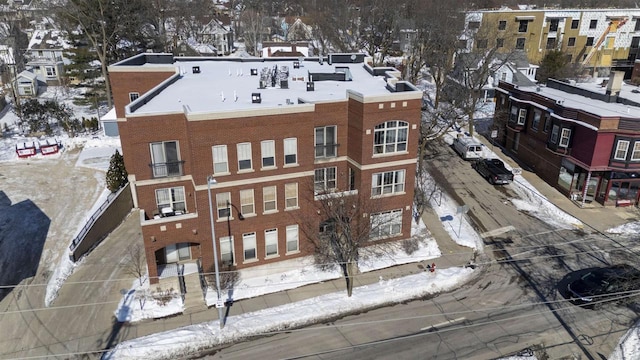 view of snow covered property