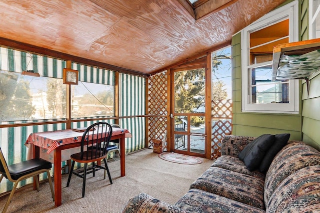 sunroom / solarium with lofted ceiling and wood ceiling