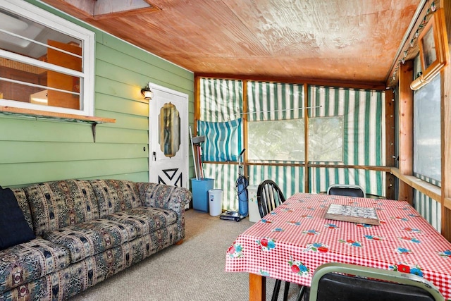 sunroom with wooden ceiling