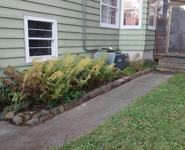 exterior details with entry steps and central AC