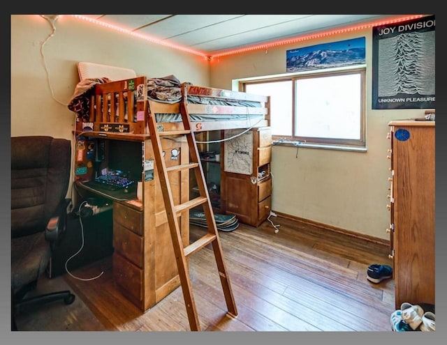 bedroom featuring hardwood / wood-style flooring