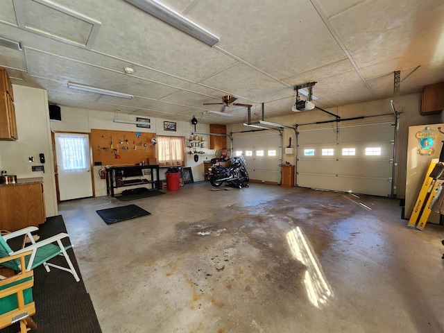 garage featuring a garage door opener