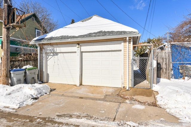 detached garage with fence