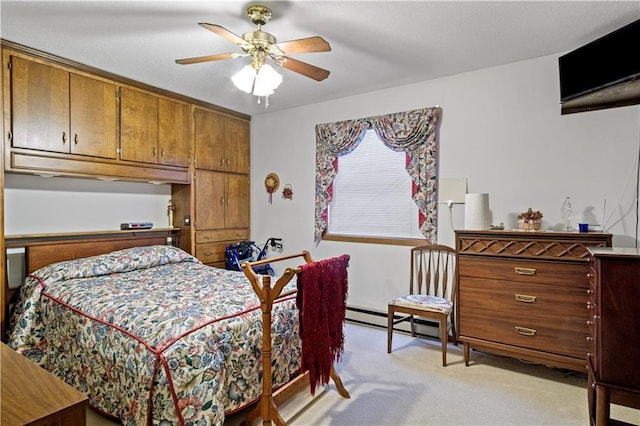 bedroom with light carpet, ceiling fan, and a baseboard radiator