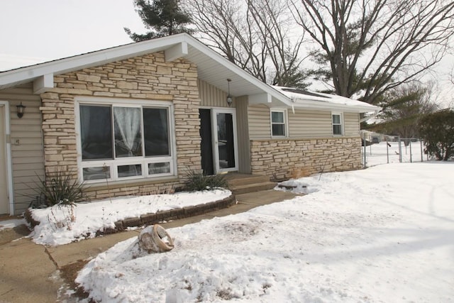 view of front of home featuring stone siding