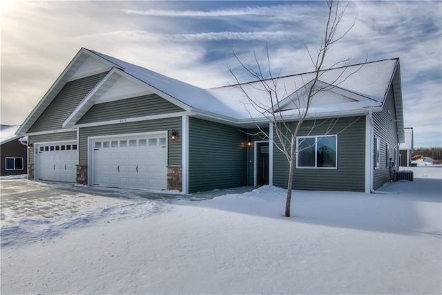 ranch-style house featuring an attached garage