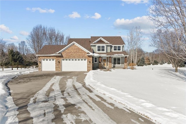 view of front of house with driveway and an attached garage