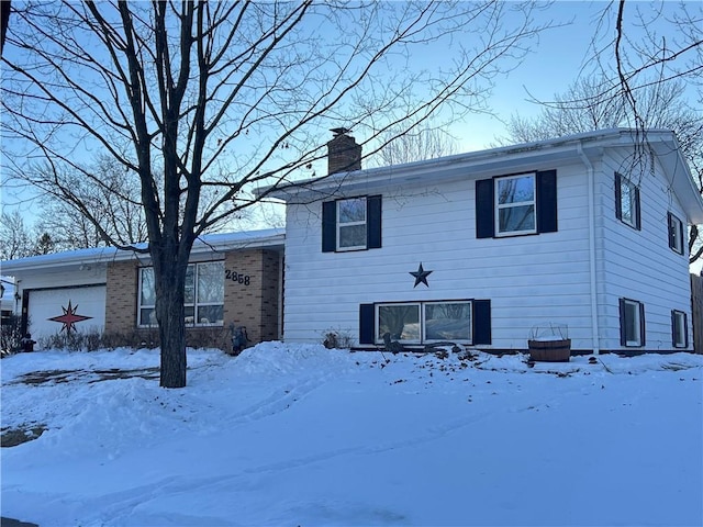 view of front of house with a chimney