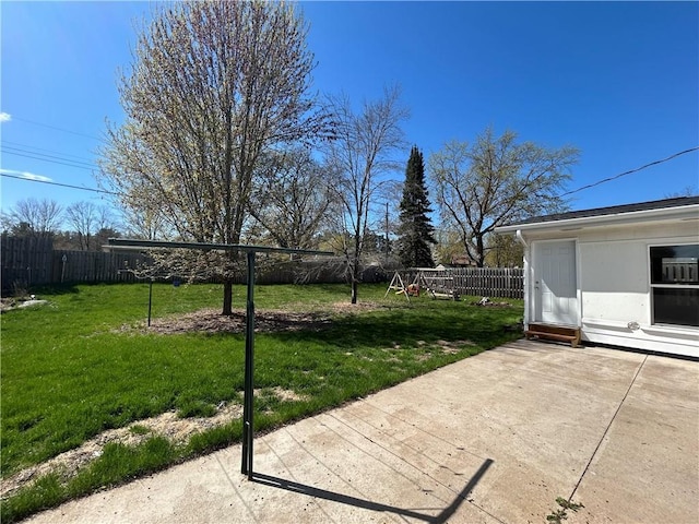 view of yard with a fenced backyard and a patio area