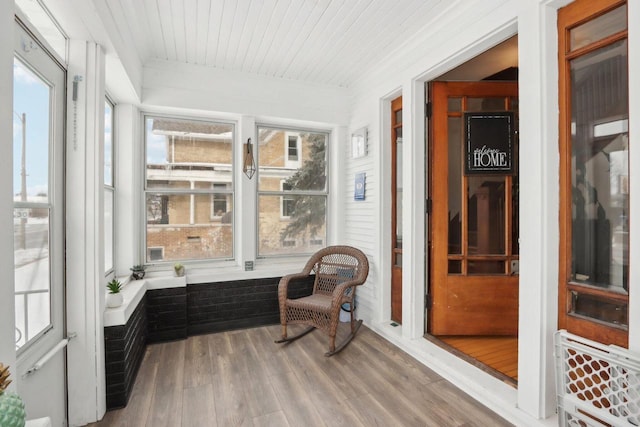 sunroom with wooden ceiling