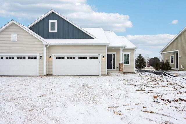 view of front of property featuring board and batten siding and an attached garage