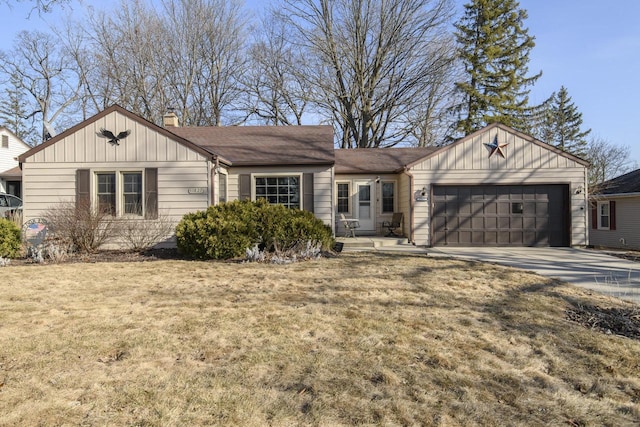 ranch-style house with board and batten siding, a front yard, a chimney, driveway, and an attached garage