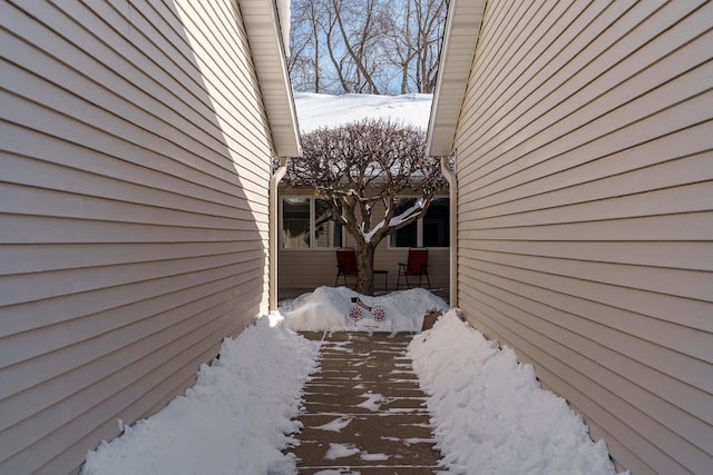 view of snow covered property