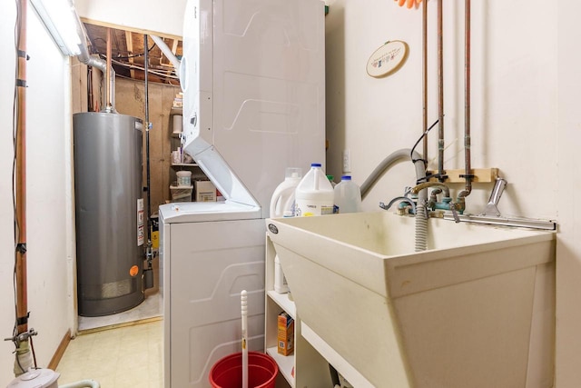 washroom featuring water heater, light floors, stacked washing maching and dryer, and a sink