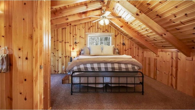 bedroom with wood ceiling, wood walls, vaulted ceiling with beams, and carpet floors