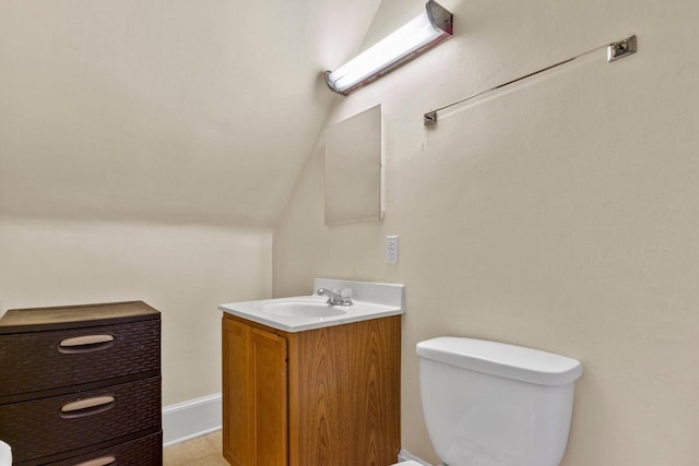 bathroom with toilet and vanity