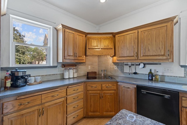 kitchen featuring brown cabinets, decorative backsplash, ornamental molding, light wood-type flooring, and black appliances