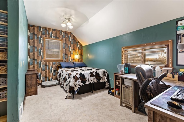 bedroom featuring light carpet and vaulted ceiling