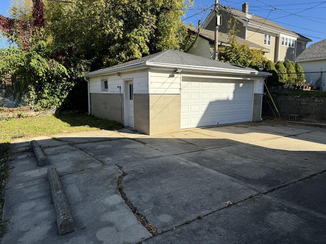 detached garage with fence