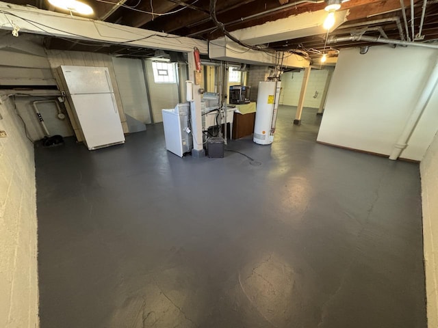 basement with washer / clothes dryer and gas water heater